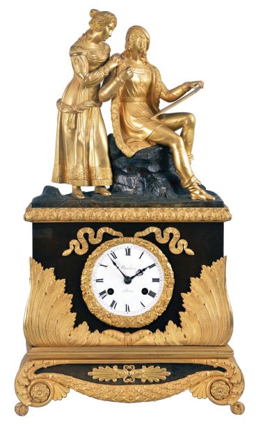 France, a gilt and patinated bronze figural mantel clock, the case in red patina, and with gilt, foliate ornament, the top with green patinated rustic landscape and gilt figures, the male figure seated on a stump, and with sketch pad or canvas, the female standing at his shoulder and admiring the work, Roman numeral white dial signed "Planchon a Paris", blued steel hands, 8 day pendule de Paris movement with silk thread suspension, signed "Pons"