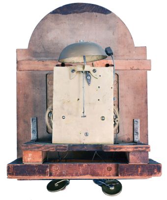 New York stye tall case clock, 8 day, time and bell strike, weight driven movement in a mahogany veneer case with broken arch top, shaped trunk door and scalloped skirt and foot. The painted wooden dial has a seconds bit.