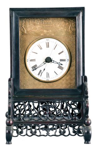 China, bracket clock reproduction, 8 day, time and strike, double fusee, crown verge with center seconds in a rosewood case on fretwork base, white porcelain dial on patterned brass front plate, 20th century.