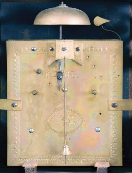 China, bracket clock reproduction, 8 day, time and strike, double fusee, crown verge with center seconds in a rosewood case on fretwork base, white porcelain dial on patterned brass front plate, 20th century.