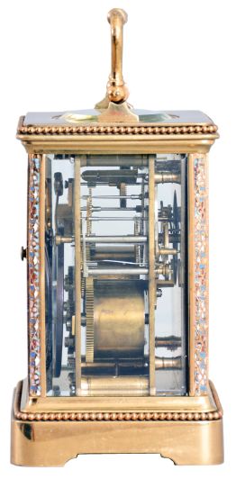 France, for Frank Herschede, Cincinnati, an 8 day, two train carriage clock with champleve enamel ormnament, polished brass Corniche case with enamel accented corners and handle, Arabic numeral white enamel dial with floral featoons, blued steel Breguet style hands, 8 day, time and strike movement with lever platform, counting the hours on a gong