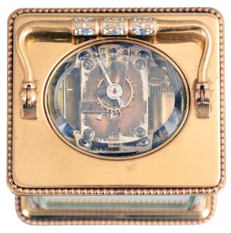 France, for Frank Herschede, Cincinnati, an 8 day, two train carriage clock with champleve enamel ormnament, polished brass Corniche case with enamel accented corners and handle, Arabic numeral white enamel dial with floral featoons, blued steel Breguet style hands, 8 day, time and strike movement with lever platform, counting the hours on a gong