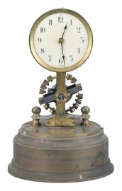 Germany, Eureka style, battery powered, electro-magnetic timepiece mounted on brass base with a large exposed rotating balance.