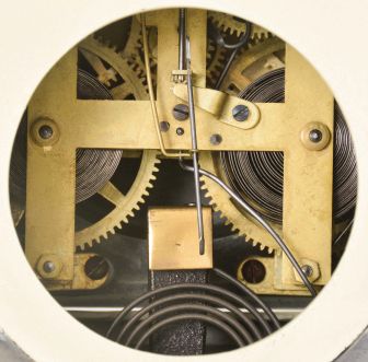 F. Kroeber Clock Co., New York, "Ivory No. 2", 8 day, time and strike, spring brass movement enameled iron mantel clock.