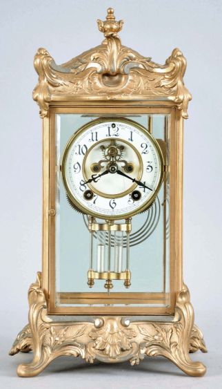 New Haven Clock Co., New Haven, Conn., "Thoreau" crystal regulator, 8 day, time and strike, spring driven movement in gilt metal case with four beveled glasses, porcelain dial with visible Brocot escapement.