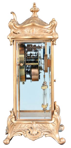 New Haven Clock Co., New Haven, Conn., "Thoreau" crystal regulator, 8 day, time and strike, spring driven movement in gilt metal case with four beveled glasses, porcelain dial with visible Brocot escapement.