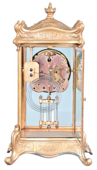 New Haven Clock Co., New Haven, Conn., "Thoreau" crystal regulator, 8 day, time and strike, spring driven movement in gilt metal case with four beveled glasses, porcelain dial with visible Brocot escapement.