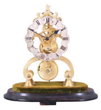 England, single fusee skeleton clock, in a well finished scroll frame, and with scalloped dial of silvered brass, nice small size, height of frame only approx. 8"