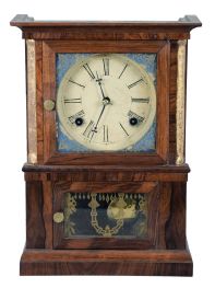 E. O. Goodwin, Bristol, Conn., 8 day, time and strike, spring brass movement miniature shelf clock.