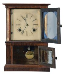 E. O. Goodwin, Bristol, Conn., 8 day, time and strike, spring brass movement miniature shelf clock.