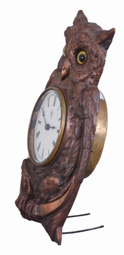 F. Kroeber Clock Co., New York, "Brass Owl ", 30 hour, time and alarm, spring driven brass movement in a brass casting of an owl with glass eyes.
