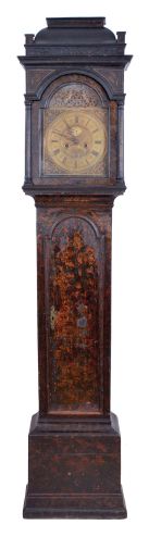 John Green, Skipton, England tall clock, 8 day, time and gong strike, weight driven movement in a chinoiserie oak case with carved coffin top, three quarter columns on hood door and quarter columns on rear of hood on applied molded base. The brass dial has an applied reticulated arch with putti holding a crown, applied cast brass spandrels and calendar and maker