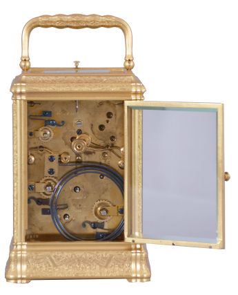 Klaftenberger, Paris, a fine, gorge cased, grand sonnerie carriage clock, the glazed, gilt case with foliate engraving and chasing, Roman numeral white enamel dial with blued steel hands, and with gilt mask, engraved to match the case, 8 day time, strike, and alarm movement with lever platform, sounding grand or petit quarters, and repeating the last hour and quarter on demand, with script "AB" stamp inside plates, and also with the mark of Henri Jacot.