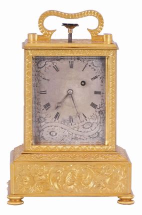 Adolph Uligh, Vienna, quarter repeating miniature carriage clock, rectilinear, gilt brass case on turned feet, the front and sides with foliate engraving, Roman numeral silvered dial, also engraved with floral decoration, blued steel Breguet style hands, round, 30 hour verge fusee movement with blued steel gongs, repeating the last hour and quarter on demand