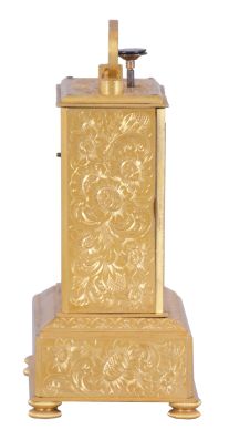 Adolph Uligh, Vienna, quarter repeating miniature carriage clock, rectilinear, gilt brass case on turned feet, the front and sides with foliate engraving, Roman numeral silvered dial, also engraved with floral decoration, blued steel Breguet style hands, round, 30 hour verge fusee movement with blued steel gongs, repeating the last hour and quarter on demand