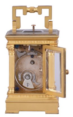 L. Tissot & Cie., Switzerland, for Chester Billings & Son, New York, miniature hour repeating carriage clock, the gilt, glazed Anglaise Riche style case in mignonette #3 size, Roman numeral white enamel dial, blued steel hands, gilt 8 day movement with lever platform and cut bimetallic balance, repeating the hours on demand, with Tissot logo at lower left, back plate, serial #54093