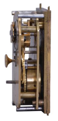 England, a very decorative miniature carriage timepiece, the gilt case with expertly engraved foliate ornament, the corners with reeded columns, surmounted by chased and engraved finials, the top with acanthus decorated handle, Roman numeral silvered dial with engraved center and gilt, engraved mask, blued steel Breguet style hands, 8 day timepiece movement with lever escapement, and spring barrel fixed to the front plate