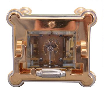 Jules Desjardin, France, carriage clock, time, strike, repeat & alarm, in a two-tone round column case, with round white dials behind a frosted gilt mask with the Arabic numerals separated by gold stars at the half hour positions. 18462