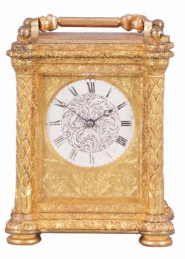 Aubert & Klaftenberger, London, a fine, small, week going English carriage timepiece, the gilt case with foliate engraving, the corners with chased, leaf decorated columns, and signed "L. Lange", Roman numeral silvered dial, the center also with engraving matching the case, blued steel Breguet style hands, and 8 day, 6 pillar fusee movement with lever escapement, serial #1061.
