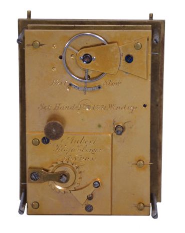 Aubert & Klaftenberger, London, a fine, small, week going English carriage timepiece, the gilt case with foliate engraving, the corners with chased, leaf decorated columns, and signed "L. Lange", Roman numeral silvered dial, the center also with engraving matching the case, blued steel Breguet style hands, and 8 day, 6 pillar fusee movement with lever escapement, serial #1061.
