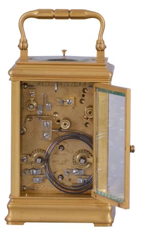 Margaine, Paris, for Henry Capt, Geneva, a Cannelee cased hour repeating carriage clock, glazed, gilt case with molded top and base, signed Roman numeral white enamel dial, blued steel spade and poker hands, 8 day time, strike, and alarm movement with lever platform, repeating the last hour on demand, the back plate with Margaines mark
