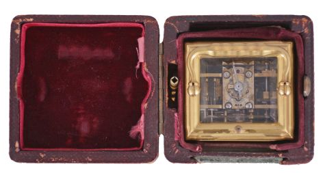 Margaine, Paris, a 3/4 size, Gorge cased hour repeating carriage clock with original outer box, gilt case with beveled glasses, Arabic numeral white enamel dial with gilt, engine turned mask, blued steel hands, 8 day time, strike and alarm movement with lever platform and cut bimetallic balance, repeating the last hour on demand, the back plate with Margaine