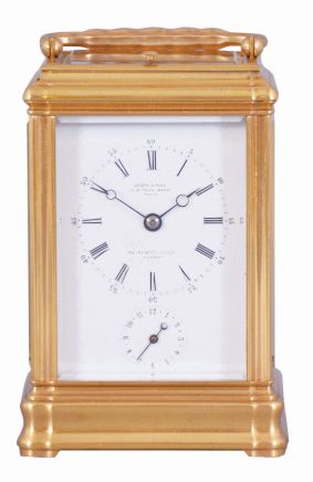 Leroy & Fils, Paris, a good, Gorge cased hour repeating carriage clock with alarm, gilt, glazed case with carrying handle, signed Roman numeral white enamel dial, bearing the firms addresses in Paris and London, blued steel Breguet style hands, 8 day time, strike and alarm movement with lever platform, and repeating the last hour on demand, the back plate marked "Repassee par Leroy & Fils Palais Royal 13 & 15, Paris", and also with the mark of Drocourt, serial #8909