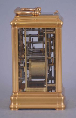 Leroy & Fils, Paris, a good, Gorge cased hour repeating carriage clock with alarm, gilt, glazed case with carrying handle, signed Roman numeral white enamel dial, bearing the firms addresses in Paris and London, blued steel Breguet style hands, 8 day time, strike and alarm movement with lever platform, and repeating the last hour on demand, the back plate marked "Repassee par Leroy & Fils Palais Royal 13 & 15, Paris", and also with the mark of Drocourt, serial #8909