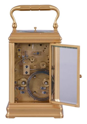Drocourt, Paris, for Henry Capt, Geneva, a Cannelee cased hour repeating carriage clock, glazed, gilt case with molded top and base, signed Roman numeral white enamel dial, blued steel Breguet style hands, 8 day time, strike, and alarm movement with lever platform, repeating the last hour on demand, the back plate with Drocourt