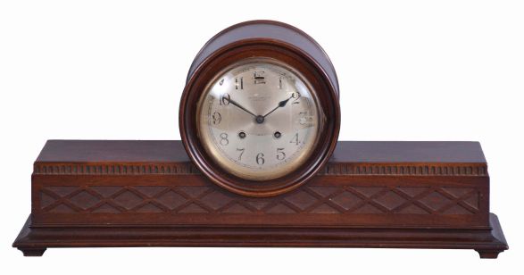 Chelsea Clock Co., Boston Mass. for Jaccard Jewelry, Kansas City, "Babro #44" mantel clock, 8 day, time and house strike, jeweled balance wheel movement in a polished mahogany case with silvered dial and blued steel hands, movement serial number 125279. Chelsea only produced this line for 6 years, so this is not a common clock.