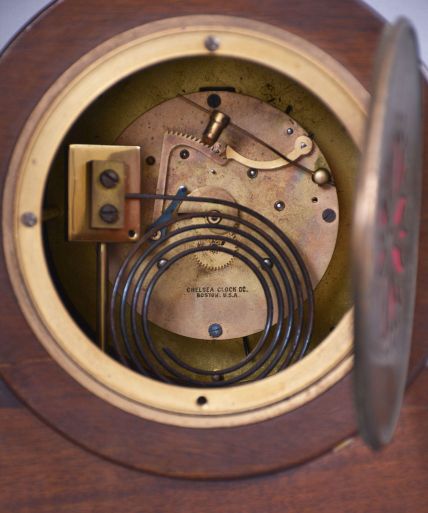 Chelsea Clock Co., Boston Mass. for Jaccard Jewelry, Kansas City, "Babro #44" mantel clock, 8 day, time and house strike, jeweled balance wheel movement in a polished mahogany case with silvered dial and blued steel hands, movement serial number 125279. Chelsea only produced this line for 6 years, so this is not a common clock.