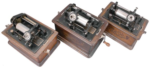 Phonographs- 3 (Three) Thomas A. Edison, Orange, NJ, "Standard" model spring driven cylinder phonographs in oak veneer cases including approximately 100 cylinder records.