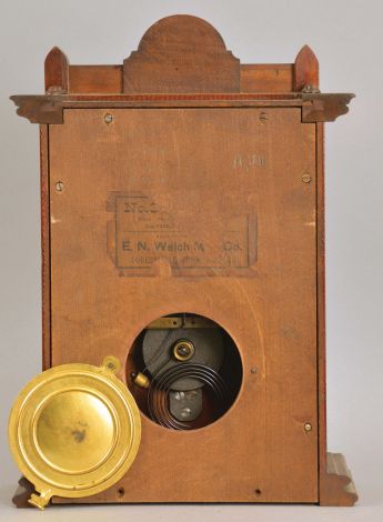 E. N. Welch Mfg. Co., Forestville, Conn., "No. 3 Cabinet", 8 day, time and strike, spring "Patti"-style brass movement mantel clock.