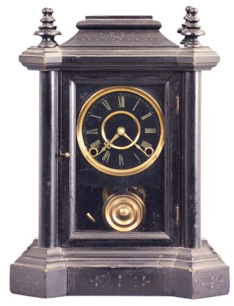 E. Ingraham & Co., Bristol, Conn., "Domino", 8 day, time and strike, spring brass movement black mantel clock.