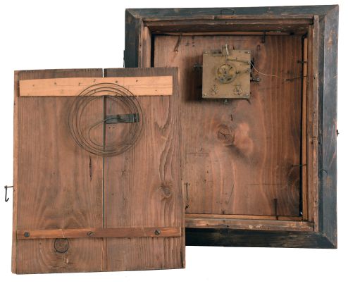 Germany, a very decorative picture frame clock, the deeply molded, gilt frame with applied floral and foliate ornament, with a good oil painting on zinc, depicting a large castle on a cliff overlooking a lake, surrounded by a verdant landscape, and signed at lower right, Roman numeral white enamel dial, blued steel trefoil hands, 30- 60 hour brass, spring driven time and strike movement with silk thread suspension