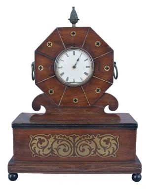 France, mantel clock, 8 day, time only, sping-driven movement with a cylinder escapement in a mahogany case with brass inlay on ball feet supporting a box with drawer that opens to the side, topped with an octagonal head holding a white paper dial with Roman numerals and metal finial.