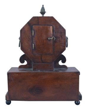France, mantel clock, 8 day, time only, sping-driven movement with a cylinder escapement in a mahogany case with brass inlay on ball feet supporting a box with drawer that opens to the side, topped with an octagonal head holding a white paper dial with Roman numerals and metal finial.