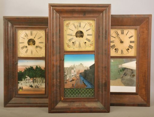 Clocks- 8 (Eight) clocks and one clock case including: 3 ogee clocks, one wooden and two brass works by Sperry & Shaw, Elisha Manross, and William S. Johnson; 2 half column and splat clocks by Daniel Pratt and David Dutton; French perpetual calendar clock parts signed R. Heslop, Paris; Unsigned German cuckoo clock; French crystal regulator with Marti movement; Black slate mantel clock case with red marble accents.