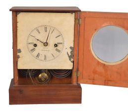Chauncey Jerome, New Haven, Conn., shelf clock with a spring driven, 8 day fusee time and strike in a mahogany veneered case.