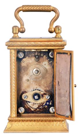 France, a miniature carriage timepiece with enamel panels and travel case, gilt case with carrying handle, the sides and back with polychrome enamel decorated copper panels, the dial with teal blue enamel ground, and decorated with polychrome birds and foliage, gilt Roman numeral chapter ring with fancy gilt hands, 8 day timepiece movement with lever platform, with original leather covered wooden travel case