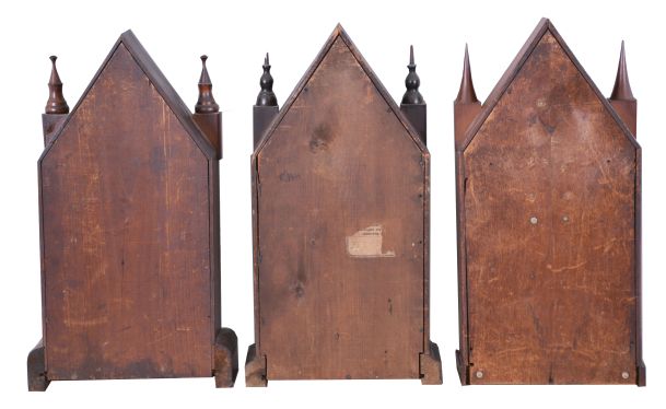 Clocks- 6 (Six): (1) Waterbury Clock Co., Waterbury, Conn., 30 hour, time, strike and alarm spring brass movement Sharp Gothic or steeple clock, c1870; (2) New Haven Clock Co., New Haven, Conn., 8 day, time and strike, spring brass movement Sharp Gothic or steeple clock, c1870 (3) William L. Gilbert Clock Co., Winsted, Conn., 8 day, time, strike and alarm Sharp Gothic or steeple clock, c1870 (4) Ansonia Clock Co., Ansonia, Conn., 30 hour, time and strike, spring brass movement Sharp Gothic or steeple clock, c1870 (5) Elisha Manross, Bristol, Conn., Sharp Gothic or steeple case only, c1850 (6) William L. Gilbert Clock Co., Winsted, Conn., 30 hour, time, strike and alarm spring brass movement Sharp Gothic or steeple clock, c1870