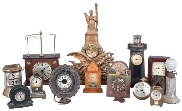 Clocks- 13 (Thirteen): (1) Horolovar repro of Flying Pendulum clock; (2) Oil lamp clock with shade (Pride of America); (3) c1904-Plato digital leaf clock; (4) Miniature New Haven OG (6in); (5) tiny 2 in movement German wall clock, weight driven; (6) New Haven lighthouse clock LESS top, duplex movement intact, (7) Mini YALE pendulette steeple clock; (8) Paper Weight ball clock, sig Brown & Willis, Fitchburg. (9) A. E. Hotchkiss nickel plated pendulette (10) Waterbury brass cased mini alarm; (11) German chain drive souvenir clock; (12) 1916 Nojar stem wind watch-clock in hard rubber case; (13) Door stop clock, Lady with broken arm.