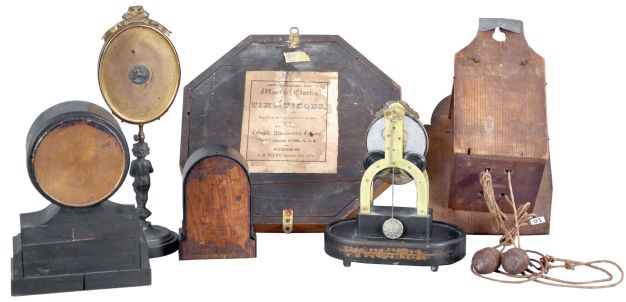 Clocks- 6 (Six) American and European: (1) Terry Clock Co.,15 day skeleton timepiece with broken dome; (2) Smallest Terry Clock Co.,iron cased alarm; (3) S. B. Terry (Terry Clock Co) Marine lever; (4) c1850 German wooden works dial clock with CROWN WHEEL, cows tail; (5) Seth Thomas ebonized case alarm and (6) French boudoir mirror timepiece [rear wind watch movement]