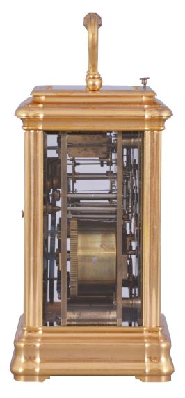 Drocourt, Paris, for Hamann & Koch, New York, an impressive, Gorge cased, grand sonnerie striking giant carriage clock, the massive gilt case with bevelled glasses, the top glass with engine turned mask with an oval aperture for viewing the escapement, Roman numeral white enamel dial also with gilt, engine turned mask, blued steel spade hands, 8 day time, strike, and alarm movement with large lever platform and cut, bimetallic balance, sounding grand or petit quarters in passing, and repeating the last hour and quarter on demand, the front plate marked "H.L.", gong bases marked "F.D." within an oval, serial #1813