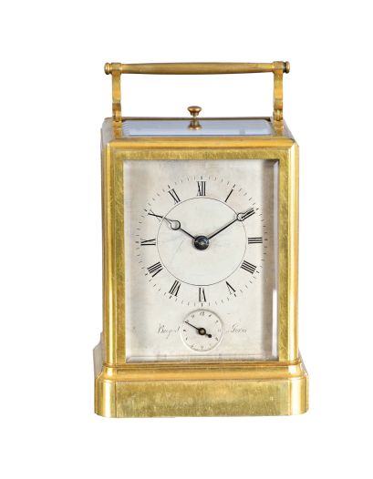 France or Switzerland, a rare, early, petit sonnerie striking carriage clock with alarm and travel case, signed Breguet, gilt, glazed, one piece case with molded base, Roman numeral silvered dial with blued steel Breguet style hands, subsidiary alarm chapter, and engraved "Breguet, a Paris", 8 day, time and strike movement with both trains driven by a single barrel, striking the last quarter in passing, and with grand sonnerie repeating on blued, wire gongs, the polished steel strikework mounted to the back plate, and also bearing a silvered plate engraved "Breguet", duplex platform escapement, with two piece steel escape wheel and brass balance, and with alarm striking on a bell in the base, contained in its original wooden, gilt stamped leather covered case with gilt hardware