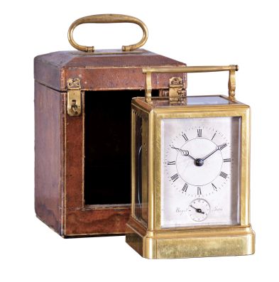 France or Switzerland, a rare, early, petit sonnerie striking carriage clock with alarm and travel case, signed Breguet, gilt, glazed, one piece case with molded base, Roman numeral silvered dial with blued steel Breguet style hands, subsidiary alarm chapter, and engraved "Breguet, a Paris", 8 day, time and strike movement with both trains driven by a single barrel, striking the last quarter in passing, and with grand sonnerie repeating on blued, wire gongs, the polished steel strikework mounted to the back plate, and also bearing a silvered plate engraved "Breguet", duplex platform escapement, with two piece steel escape wheel and brass balance, and with alarm striking on a bell in the base, contained in its original wooden, gilt stamped leather covered case with gilt hardware