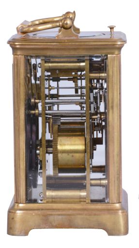 France, for Tiffany & Co., New York, a rare five minute repeating carriage clock, glazed Corniche case, signed Roman numeral white enamel dial, blued steel hands, 8 day, time and strike movement with lever platform and cut bimetallic balance, counting the hours in passing, and repeating the last hour and five minute interval on demand, together with its leather covered wooden travel case