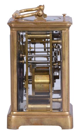 France, for Tiffany & Co., New York, a rare five minute repeating carriage clock, glazed Corniche case, signed Roman numeral white enamel dial, blued steel hands, 8 day, time and strike movement with lever platform and cut bimetallic balance, counting the hours in passing, and repeating the last hour and five minute interval on demand, together with its leather covered wooden travel case