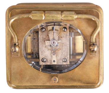 France, for Tiffany & Co., New York, a rare five minute repeating carriage clock, glazed Corniche case, signed Roman numeral white enamel dial, blued steel hands, 8 day, time and strike movement with lever platform and cut bimetallic balance, counting the hours in passing, and repeating the last hour and five minute interval on demand, together with its leather covered wooden travel case