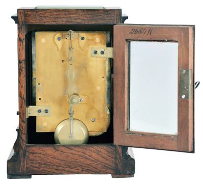 England, a miniature rosewood bracket form fusee timepiece, the glazed, architectural case with footed, molded base supporting a bombe surface the upper, rectilinear portion with cavetto cornice molding, Roman numeral silvered dial with blued spade and whip hands, the door with matching, silvered liner, 8 day, brass timepiece movement with recoil escapement, and brass pendulum with tie down for transport
